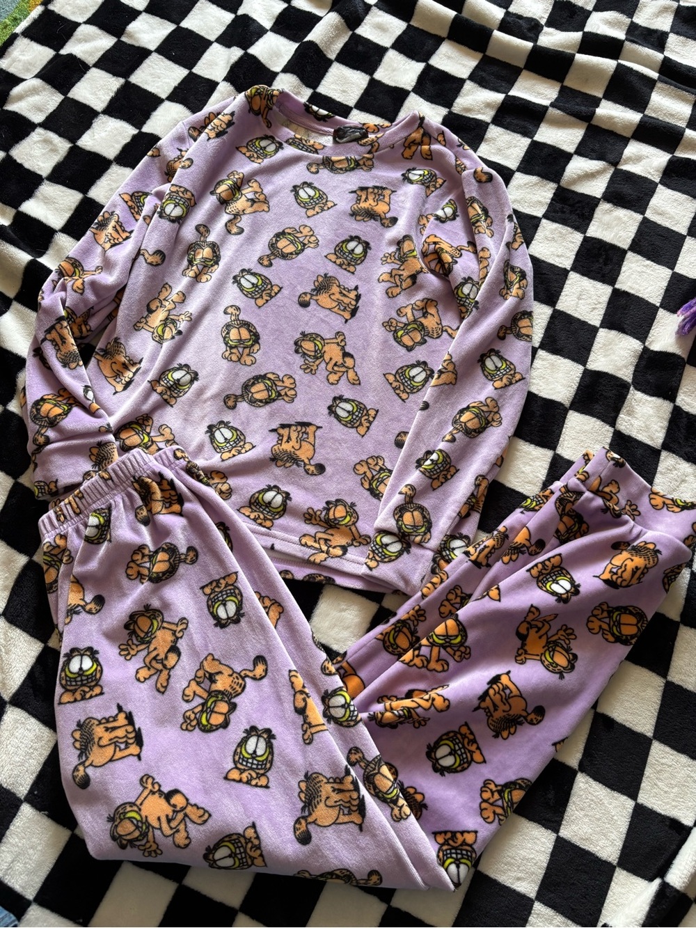 Girls medium 10/12 Garfield pjs (small stain pictured)